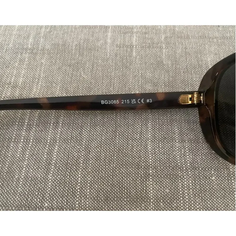 New BCBGeneration Womens Polarized Brown Tortoise Shell Oval Sunglasses